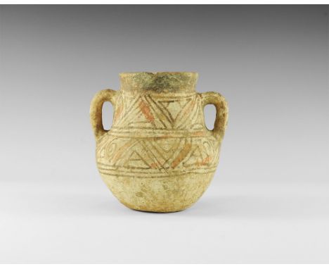 8th-10th century AD. A ceramic jar with bulbous body, tapering shoulder, flared mouth, two round-section handles to the shoul
