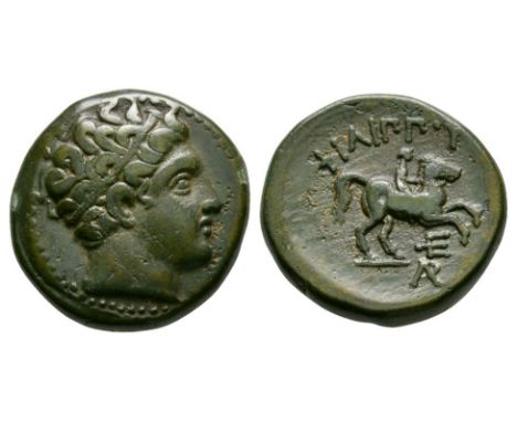 359-336 BC. Mint in Macedonia. Obv: head of Apollo right, hair bound in a taenia. Rev: FILIPPOY legend above youthful rider o