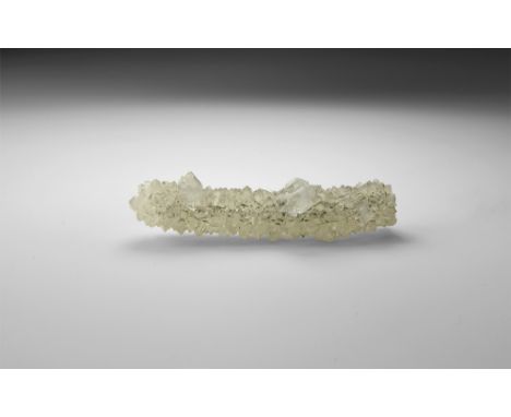 An unusual stalactitic growth of the zeolite apophyllite, in old white card tray. See Bonewitz, Dr. Ronald Louis, Rocks & Min