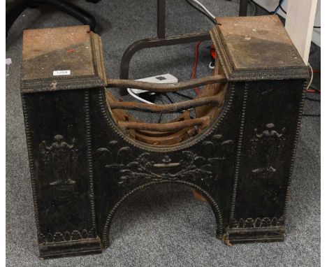 A Cast Iron Fire Grate, decorated with figures and fleur-de-lys, 66cm by 31cm by 54cm