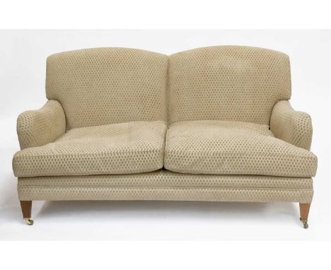 A Joanna Marco Interiors Two Seater Sofa , on tapering square section legs on brass caps and castors, 156cm by 100cm by 82cmS