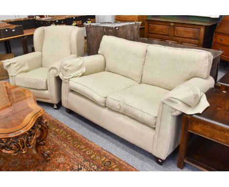 A Two Seater Cottage Sofa, upholstered in grey fabric, 154cm by 90cm by 79cm, together with a matching armchair (2)