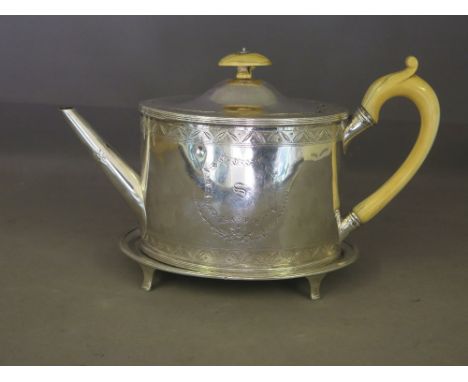 A superb Georgian and very rare bright cut silver teapot by William Frisbee and Paul Storr - Hallmarked London 1792 - the ova