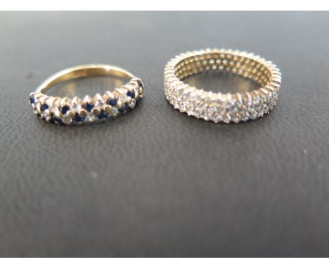 A cubic zirconia and sapphire two-row ring - Stamped 18ct - Ring size N - Weight approx 2.3gms - Together with a cubic zircon