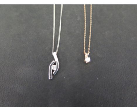 Two diamond-set pendants - One suspended from a fancy-link chain, one from a curb-link chain - Lengths 46 and 49cms - With ma