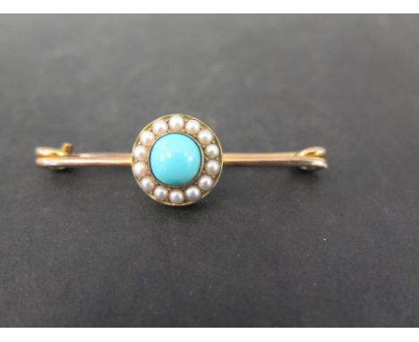 A turquoise and seed pearl cluster bar brooch - Stamped 9ct - Length 5cms - Weight approx 5.9gms
Condition Report: Good to fa