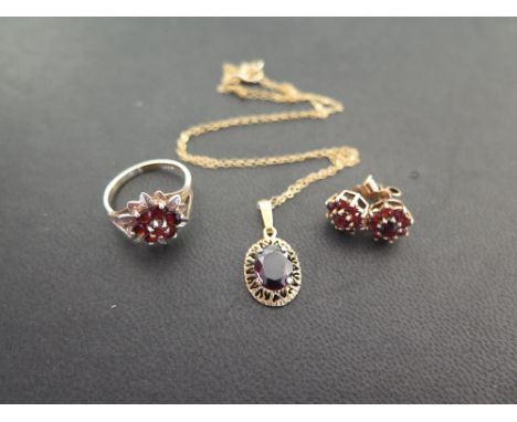 A selection of garnet jewellery - To include a floral cluster ring - Size L - A pair of cluster ear studs - Together with an 