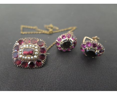 An early 20th century gold garnet and seed pearl brooch - Length 2cms - Weight approx 5.6gms - Together with a pair of gem-se