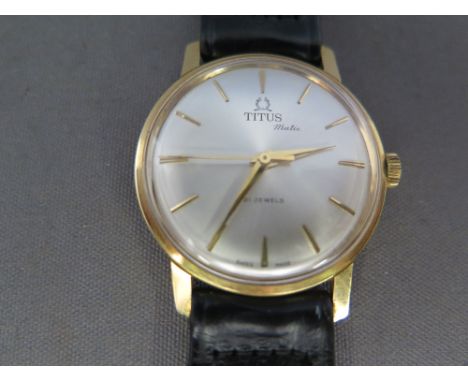 A 9 ct gold gents Titus manual Matic gents wristwatch - Width 3.5 cm including winder no. 6913 - 
Condition report:  Some wea