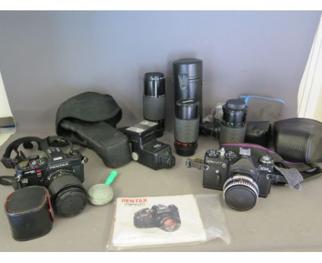 A collection photographic equipment to include a Pentax program, a SLR camera with Sigma 1:2  8 - 4  35 - 70 mm lens, a Sigma