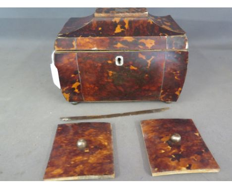 A Georgian tortoise-shell tea caddy with shallow pagoda top inlaid with pewter stringing - Height 14 cm x Width 18.55 cm x De