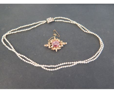 An early 20th century 15ct gold pink zircon and seed pearl brooch - Width 3.5cms - Weight approx 7.0gms - Together with a two