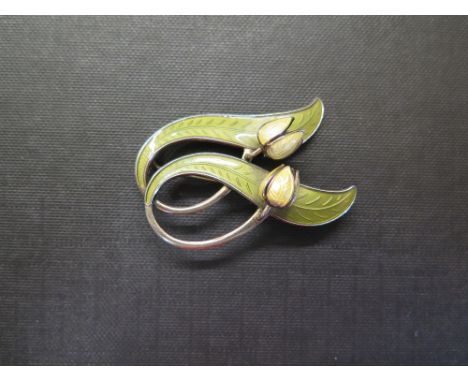 An enamel floral scroll brooch - Stamped Norway Sterling 925S - Width 5cms - Weight approx 12.1gms
Condition Report: Good - W