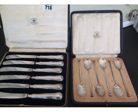 A boxed set of six Mappin and Webb silver teaspoons and a boxed set of six silver handled butter knives 
Condition report: Su