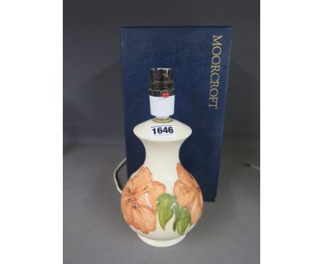 A Moorcroft table lamp - Height 24 cm - with box
Condition report: Overall good condition 