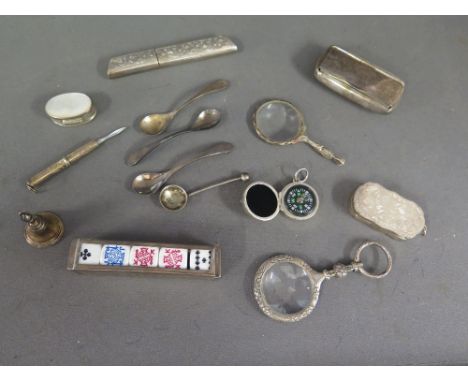 Ten hallmarked silver items including toothpick, Poker dice holder, snuff box and four other pieces including two magnifying 