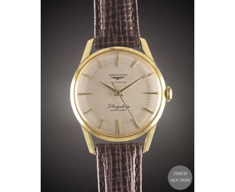 A GENTLEMAN'S 18K SOLID GOLD LONGINES FLAGSHIP AUTOMATIC CHRONOMETER WRIST WATCH
CIRCA 1959, REF. 1403

Movement:&nbsp;27J, a
