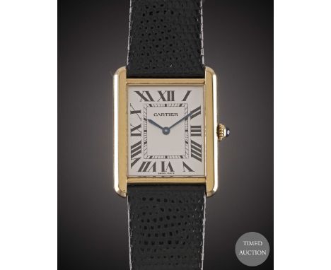 A GENTLEMAN'S LARGE SIZE STEEL &amp; SOLID GOLD CARTIER TANK SOLO WRIST WATCH
DATED 2007, REF. 2742 WITH ORIGINAL BOX &amp; P