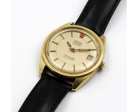 Herrenarmbanduhr "Omega", Modell "Seamaster Chronometer electronic f 300 Hz". Tonnenförmiges 750/000 GG-Gehäuse mit verschrau