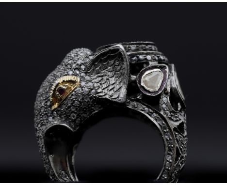 A 835 silver cocktail ring, completely designed in the shape of an elephant, completely pavé set all around with rose-cut dia