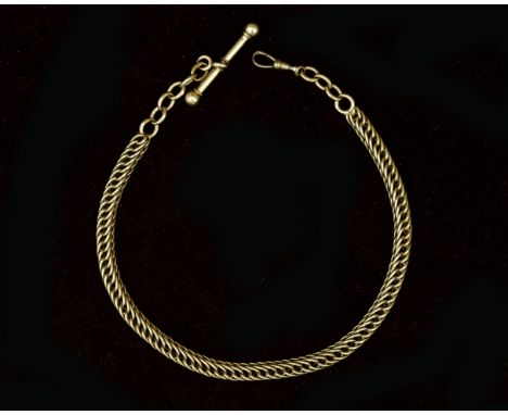 A 14 karat gold watch chain with stick lock. Gross weight: 73.2 g. Lengte: 35 cm 