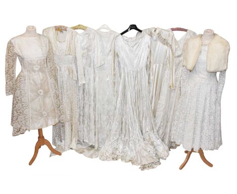 Early 20th Century Wedding Gowns, comprising a John Selby cream silk long sleeved full length dress, with jacket style bodice