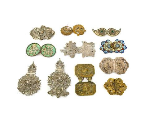 Assorted Early to Mid 20th Century Eastern Buckles, comprising a buckle incised with flower heads and impressed 'silver', gre