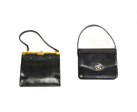 Circa 1960s Christian Dior Black Leather Handbag, with two faux buttoned pockets to the front, brass hardware, leather lining
