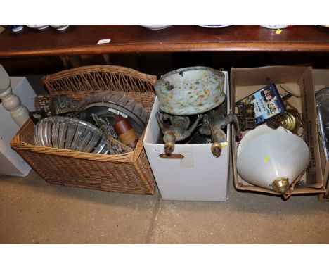 Three boxes containing various light fittings, Art Deco light shades, Spelter figural table lamps and a clock movement