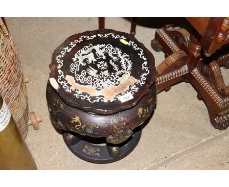 A Chinese lacquered and decorated plant stand with pearl inlay
