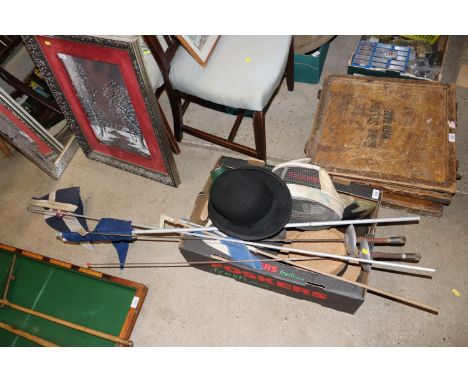 A box containing various hats; fencing foils; flags; fencing masks; enamel light shade etc