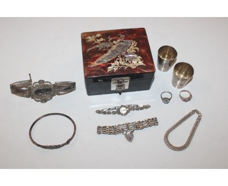 Two white metal shot cups; a silver gate link bracelet with padlock clasp; an Italian 925 bracelet; silver cocktail watch; a 