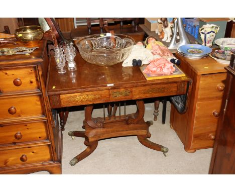 A regency styled rosewood brass inlaid sofa table 