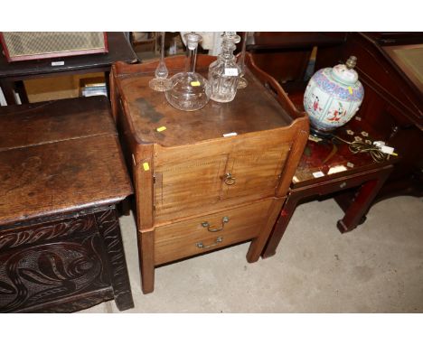 A Georgian mahogany and chequer band inlaid commode