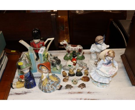 A quantity of wade whimsies, novelty teapot, two coalport figures