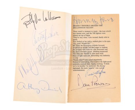 A main-cast autographed paperback novelisation of Irvin Kershner's Star Wars: The Empire Strikes Back. The book is a first ed