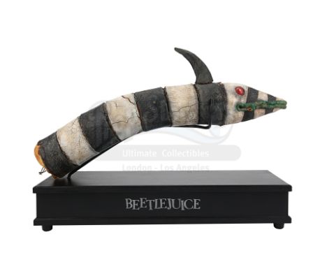 A Sandworm puppet from Tim Burton's horror comedy Beetlejuice. This puppet was created by the production for stop-motion sequ