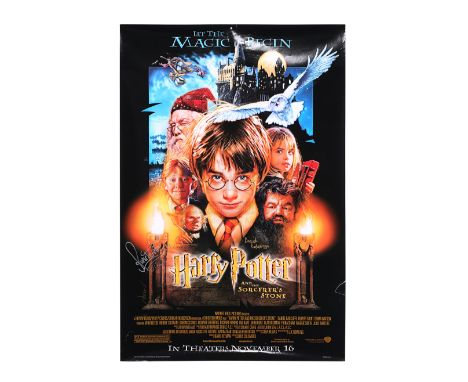 An autographed poster from the promotion of Chris Columbus' fantasy-adventure film Harry Potter and the Philosopher's Stone. 