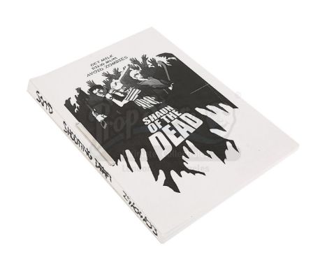 A shooting script from the production of Edgar Wright's horror comedy Shaun of the Dead. Bound with a metal clip, the front c