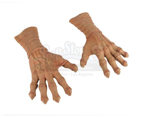 A Cantina band member's creature hands from George Lucas' Star Wars: A New Hope. The seven-piece band - known as Figrin D'an 