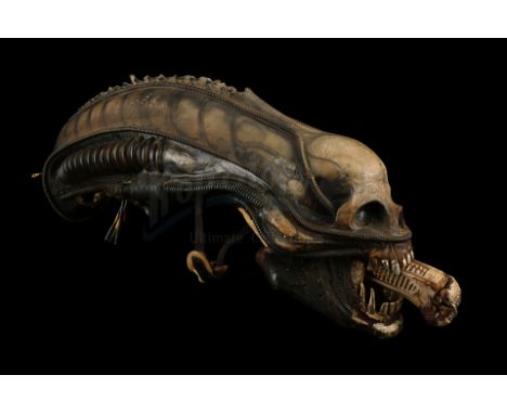 An H.R. Giger-designed special effects mechanical alien head from the production of Ridley Scott's sci-fi horror Alien. The A