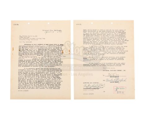 A two-page Universal Studios contract detailing Clint Eastwood's employment with the company in 1954. The contract features s