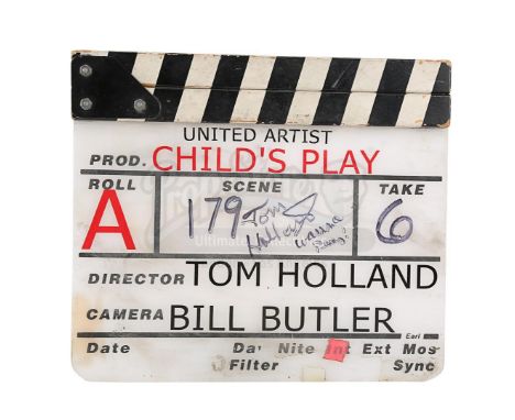 An autographed production-used clapperboard from Tom Holland's horror film Child's Play. Used by the "A" camera unit during f