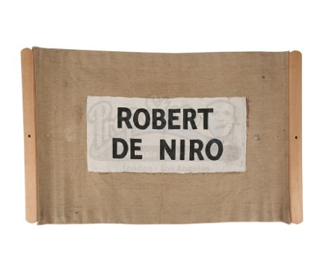 Robert De Niro's chair back from Terry Gilliam's dystopian comedy Brazil. Chair backs were used throughout the production, wi