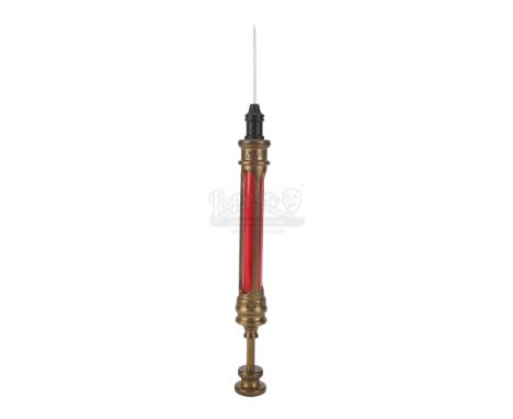 A special effects retractable werewolf antiserum syringe from Stephen Sommers' fantasy-adventure film Van Helsing. After Van 