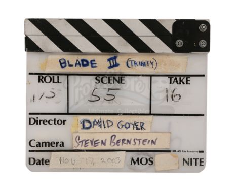 A production-used clapperboard from David S. Goyer's action-horror sequel Blade: Trinity. The clapperboard consists of an acr