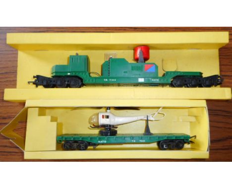 Tri-ang Railways. R. 128 Helicopter operating car. R. 341 Searchlight Wagon. Both boxed, 1 defective.