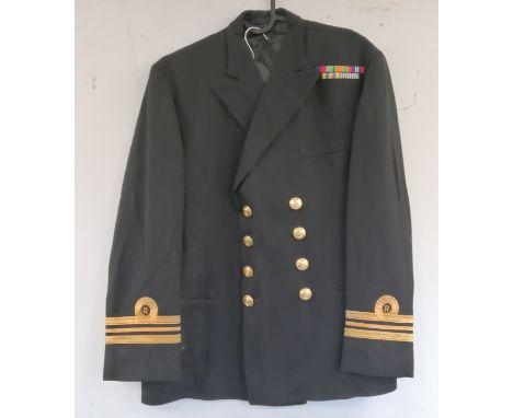 British Royal Navy dress uniform jacket having Sabre of London label, brass naval buttons by Firmin, bullion wire cuff rings 