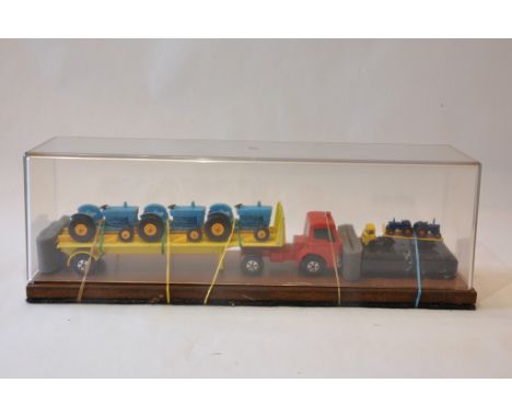 Bespoke Presentation piece comprising Matchbox Truck with Tractor Load and smaller scale Edition. 