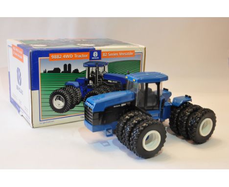 Ertl Collectables 1/32 New Holland 9882 Articulated Tractor with duals. Mint in Box.